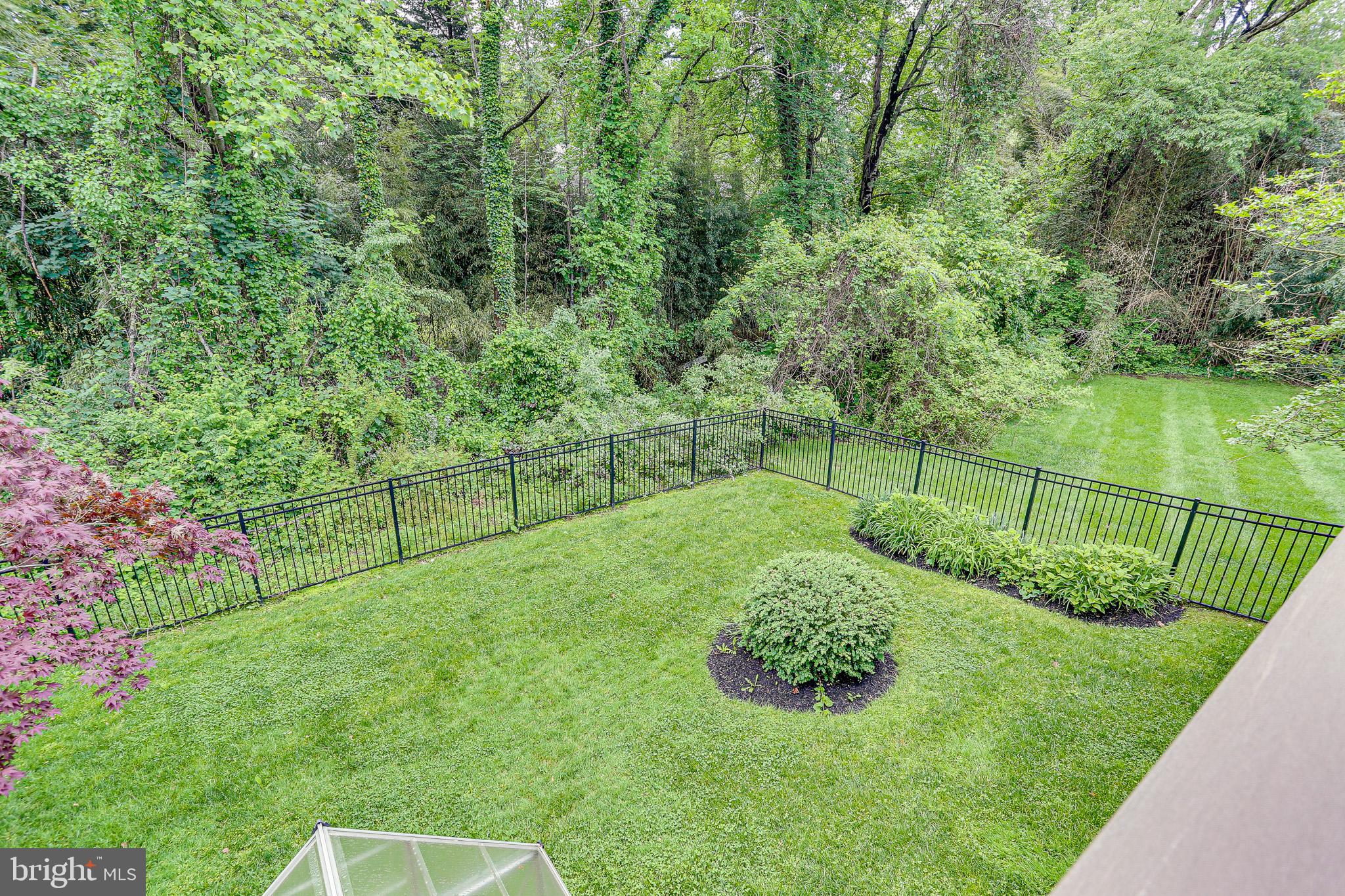4011 Hummer Road Annandale, VA 22003 - Photo 48 of 56 Wooded land, with small brook, beyond the yard.