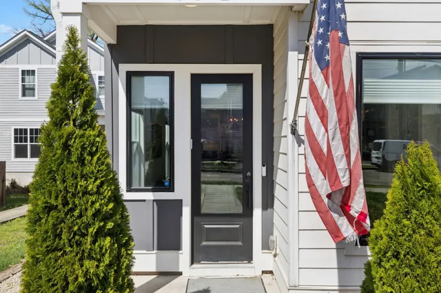 front view of a house with a yard