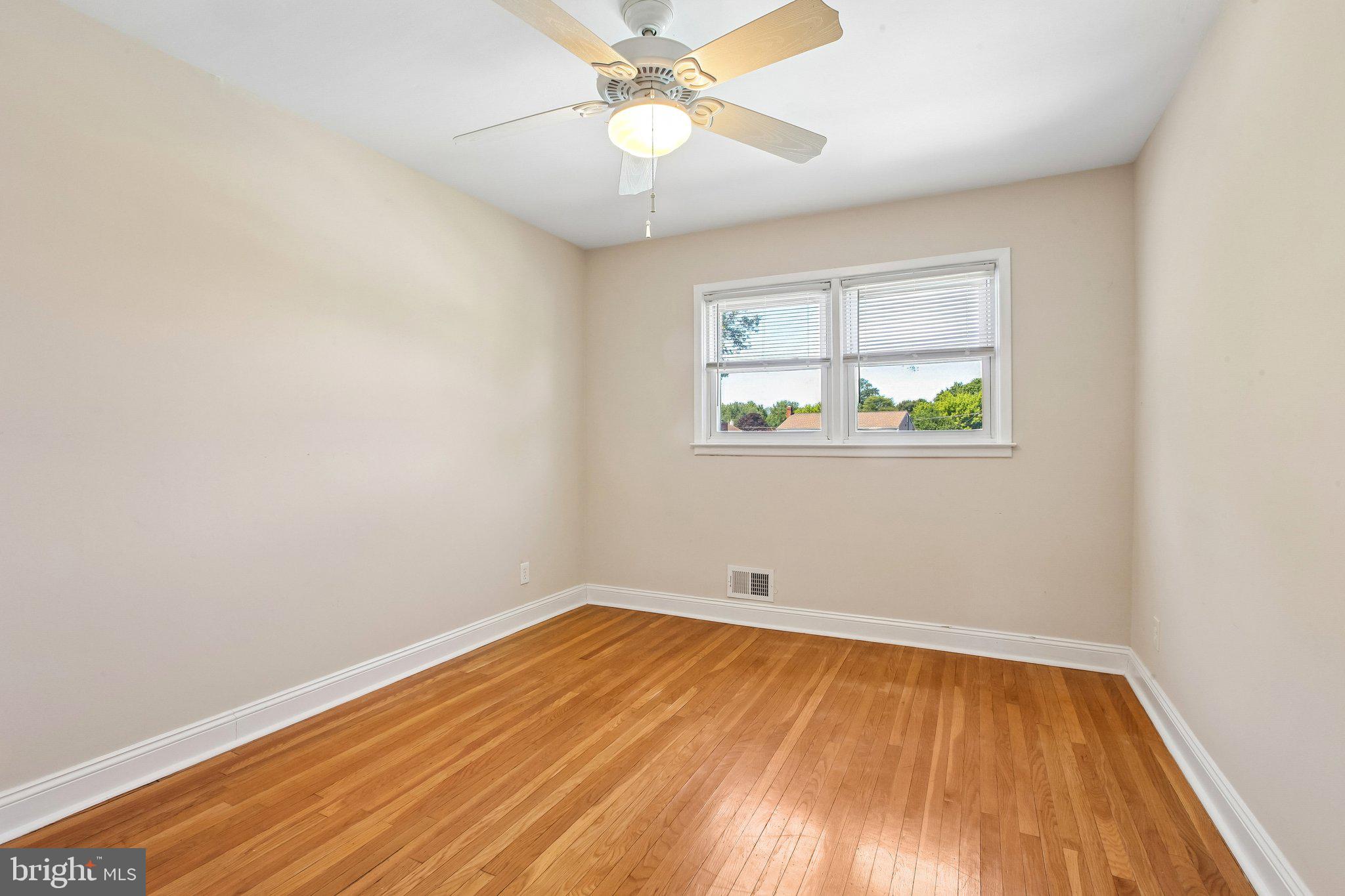 56 Whitehall Road Hamilton, NJ 08690 - Photo 29 of 37 Bright and airy room with hardwood floors.
