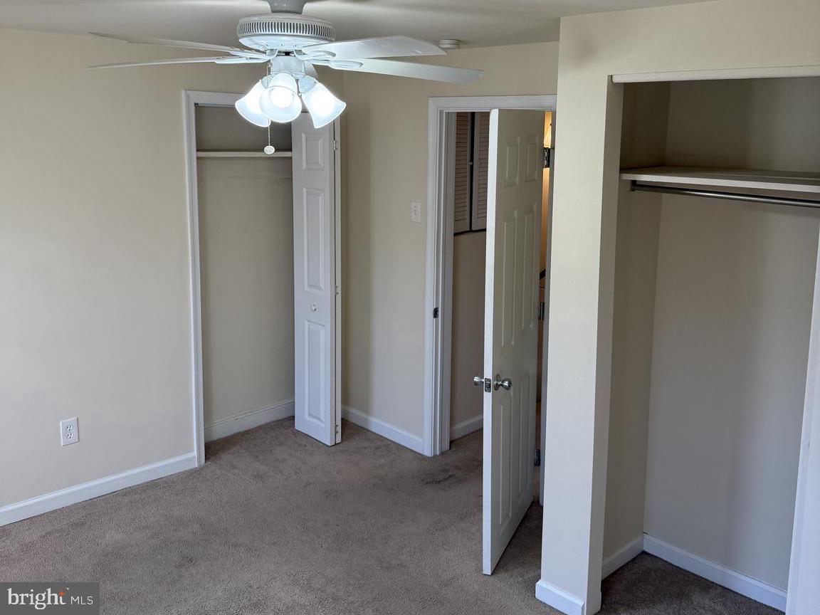 223 Gerritt Street Philadelphia, PA 19147 - Photo 7 of 10 a view of a hallway with a chandelier fan