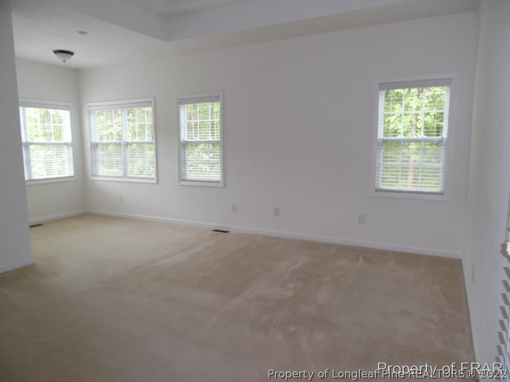 76 Ithica Lane Bunnlevel, NC 28323 - Photo 15 of 35 an empty room with windows