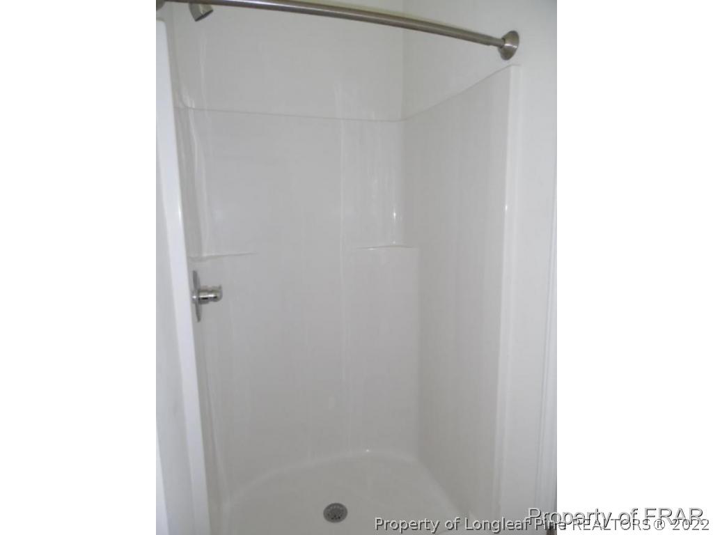 76 Ithica Lane Bunnlevel, NC 28323 - Photo 18 of 35 a bathroom with a shower