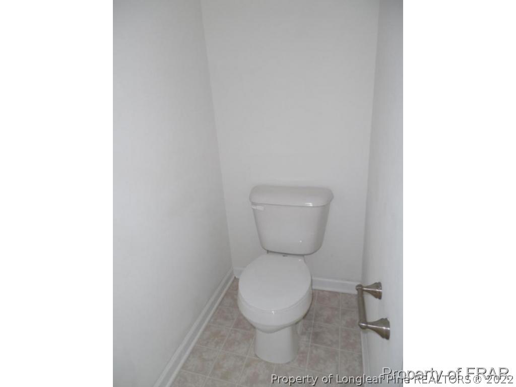 76 Ithica Lane Bunnlevel, NC 28323 - Photo 20 of 35 a close view of a toilet in bathroom