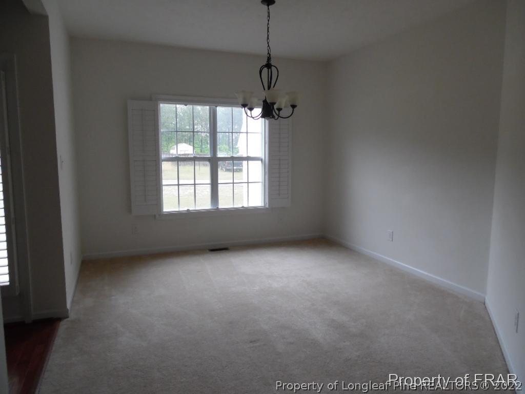 76 Ithica Lane Bunnlevel, NC 28323 - Photo 4 of 35 a view of an empty room with a window