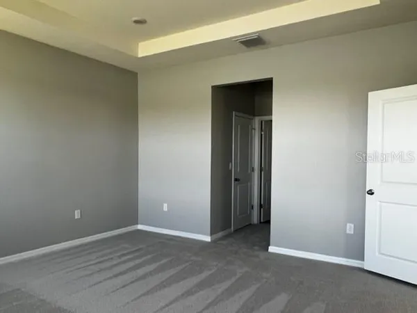 a view of an empty walk in closet