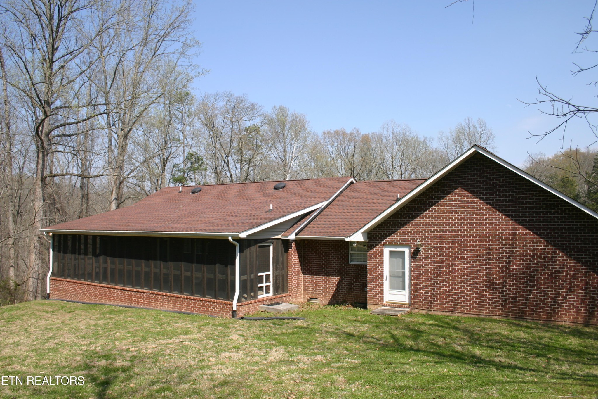 163 Upper Clear Creek Road Andersonville, TN 37705 - Photo 13 of 15 a front view of a house with a yard and garage