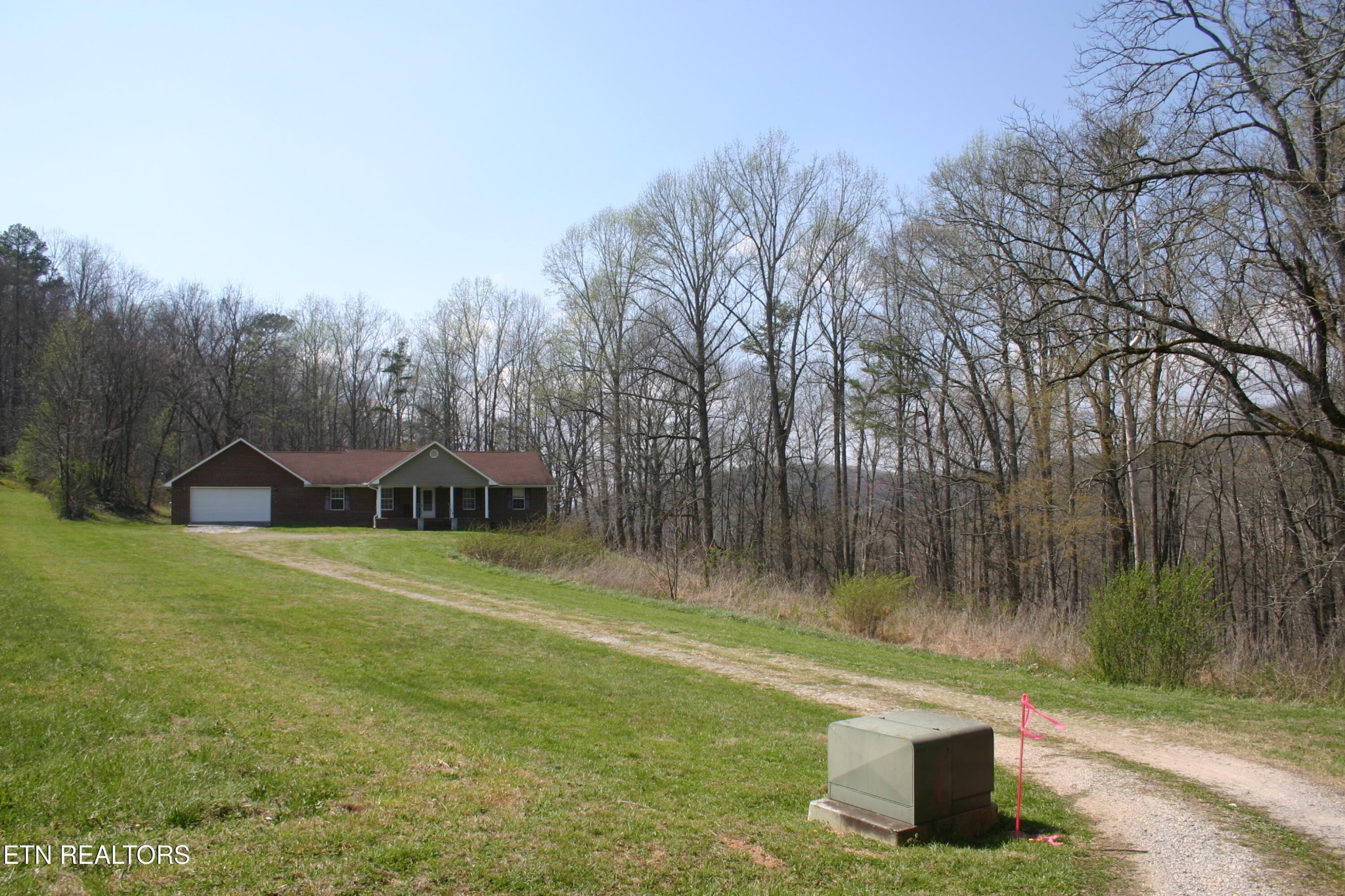 163 Upper Clear Creek Road Andersonville, TN 37705 - Photo 15 of 15 a view of a wooden house with a yard