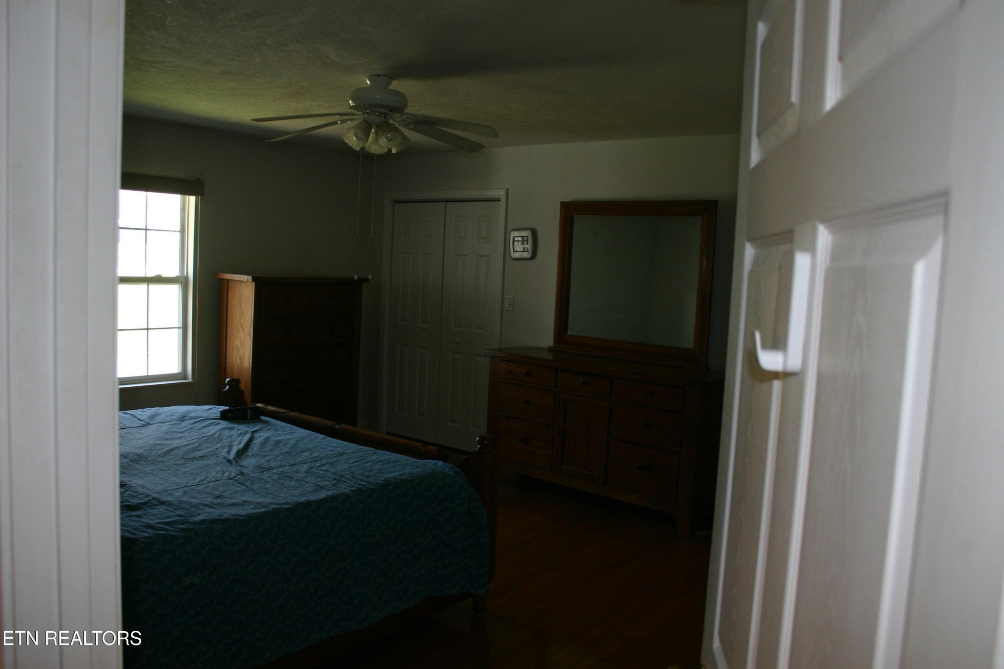 163 Upper Clear Creek Road Andersonville, TN 37705 - Photo 9 of 15 a living room with furniture and a gate