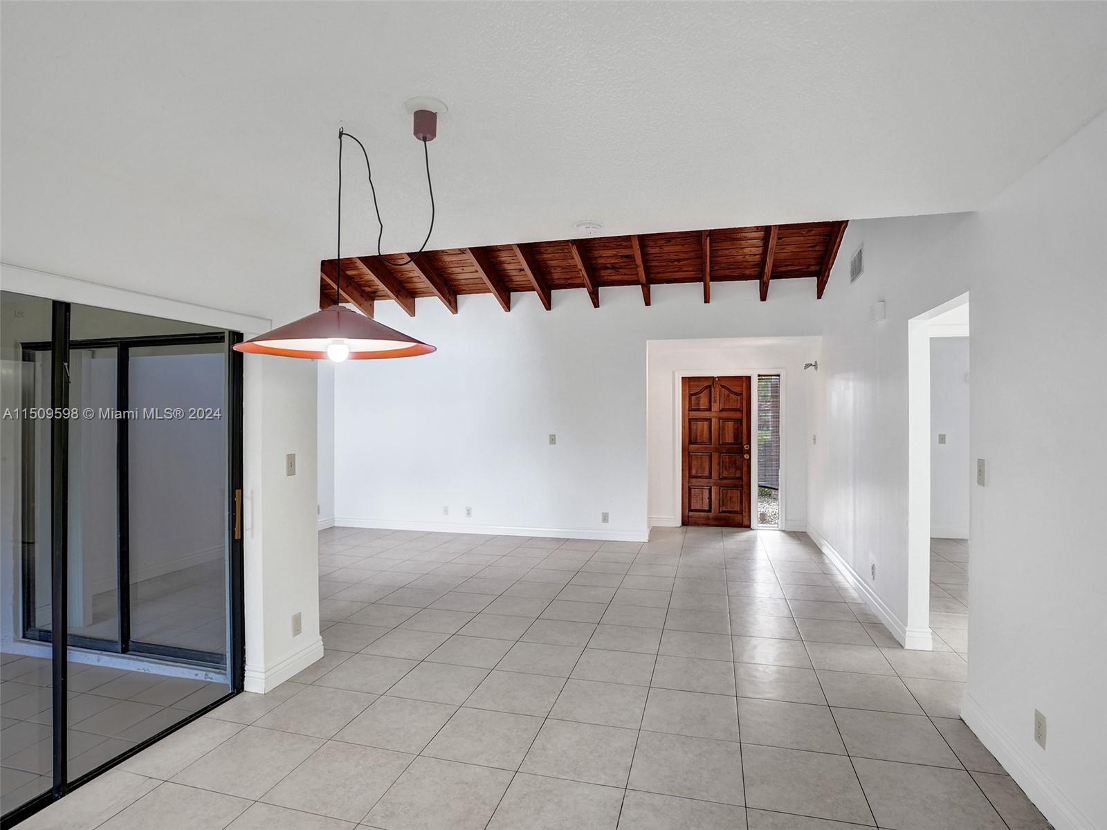 19621 Back 9 Drive Boca Raton, FL 33498 - Photo 11 of 45 an empty room with windows and closet