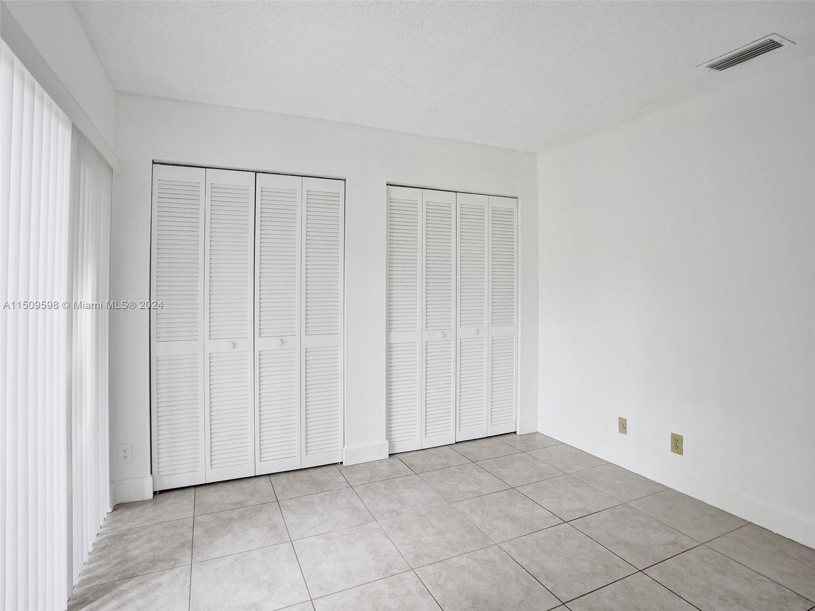 19621 Back 9 Drive Boca Raton, FL 33498 - Photo 18 of 45 a view of an empty room