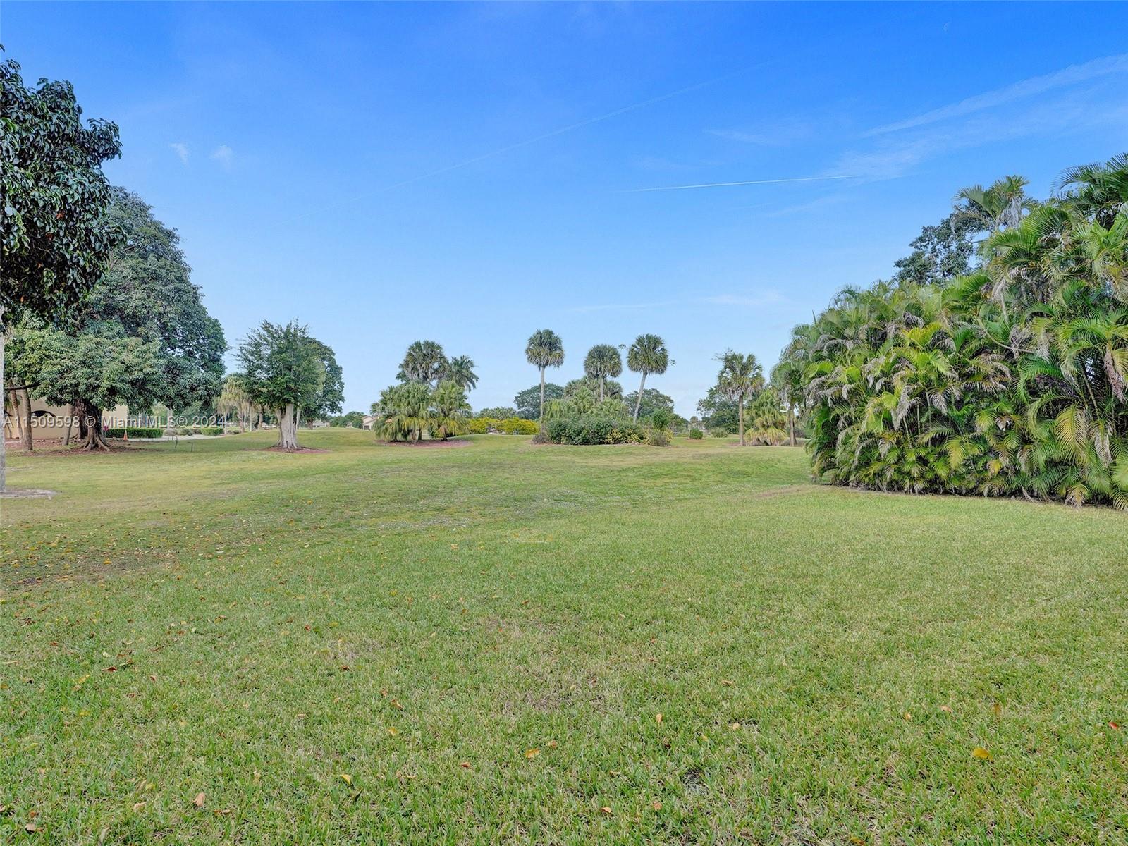 19621 Back 9 Drive Boca Raton, FL 33498 - Photo 39 of 45 a view of a field with an trees