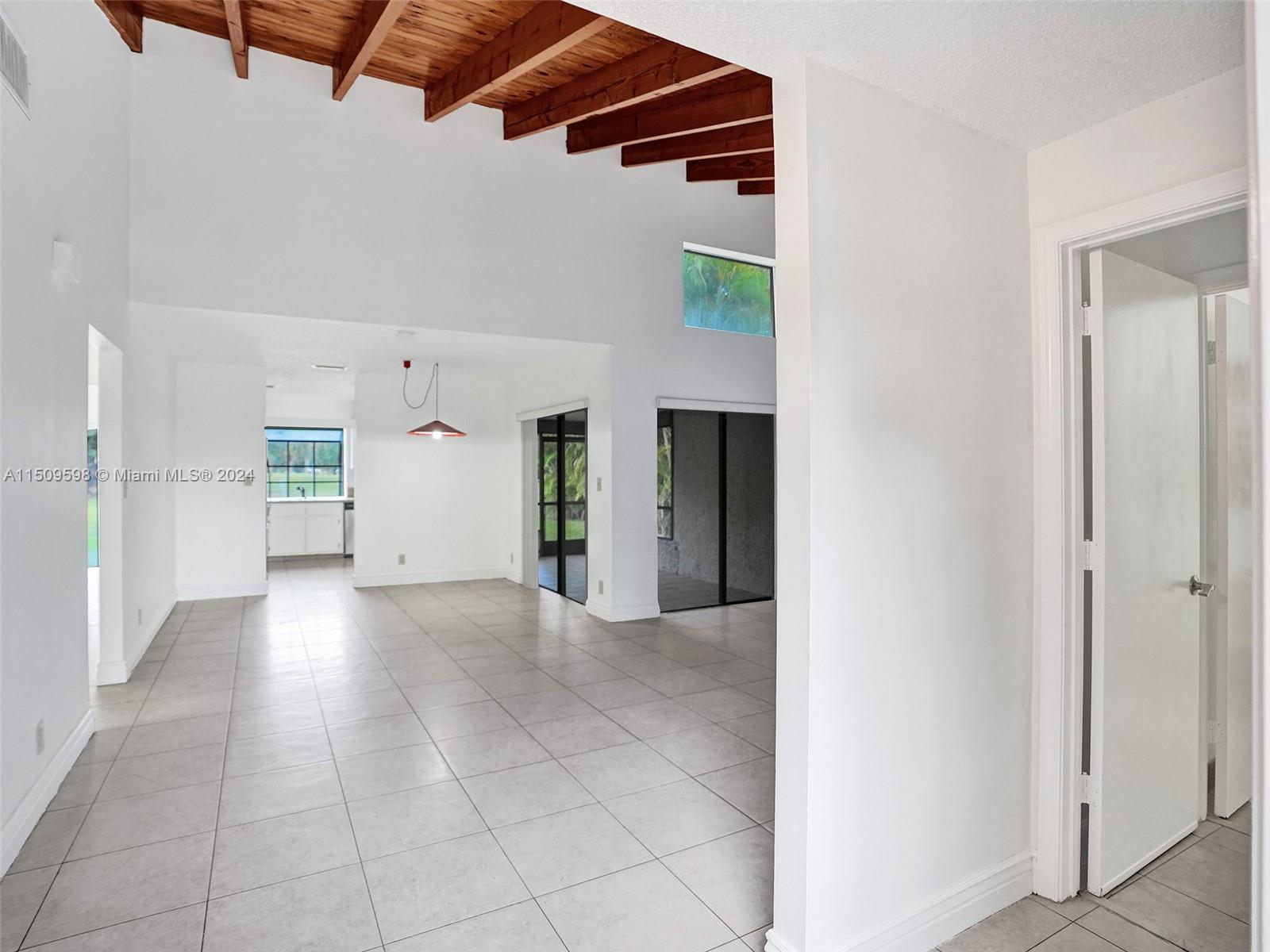 19621 Back 9 Drive Boca Raton, FL 33498 - Photo 8 of 45 a view of a room with an empty space