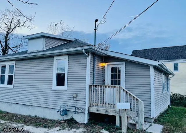 a front view of a house with a balcony