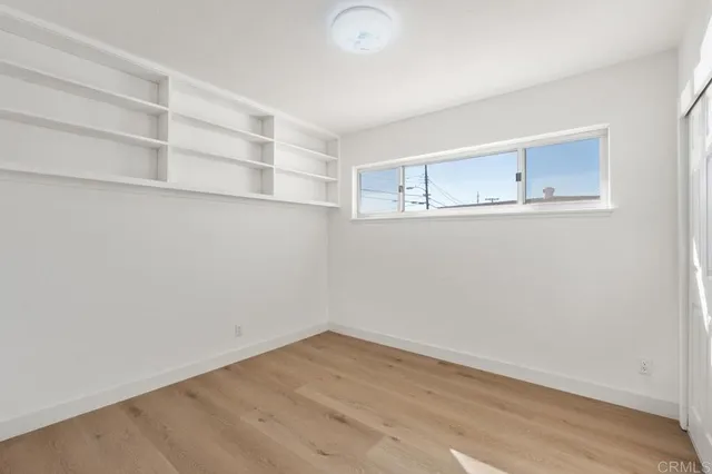 a view of an empty room with empty racks