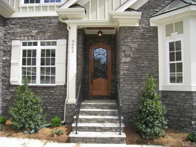 3505 Griffice Mill Road Raleigh, NC 27610 - Photo 1 of 12 a front view of a house with a garden