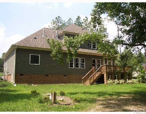 3505 Griffice Mill Road Raleigh, NC 27610 - Photo 12 of 12 a view of a house with a yard