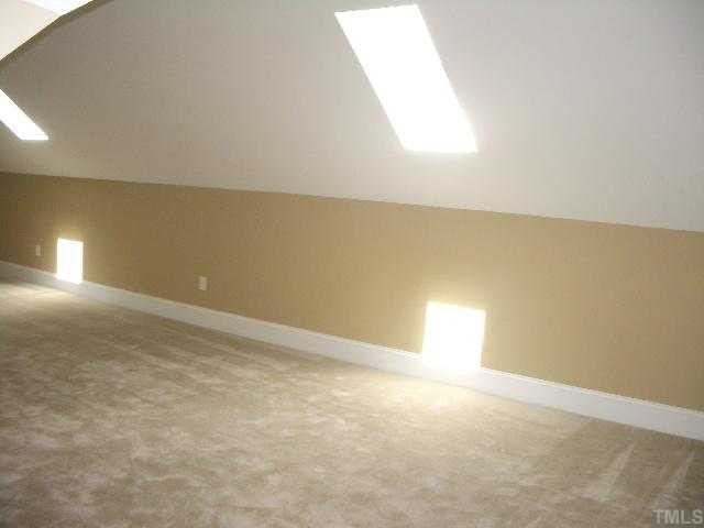 3505 Griffice Mill Road Raleigh, NC 27610 - Photo 7 of 12 an empty room with a window