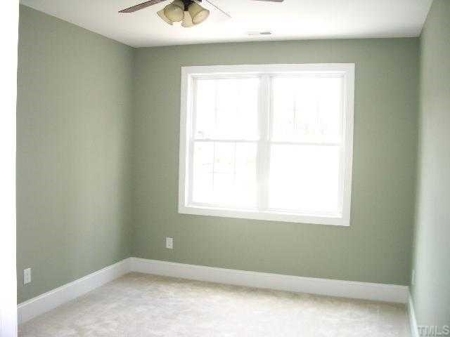 3505 Griffice Mill Road Raleigh, NC 27610 - Photo 10 of 12 a view of a room that has a window in it