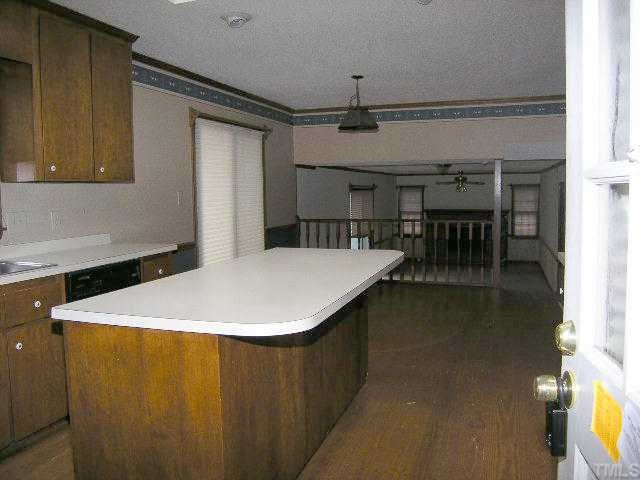 1108 Imperial Road Cary, NC 27511 - Photo 2 of 5 a very nice looking dining room with a table and chairs