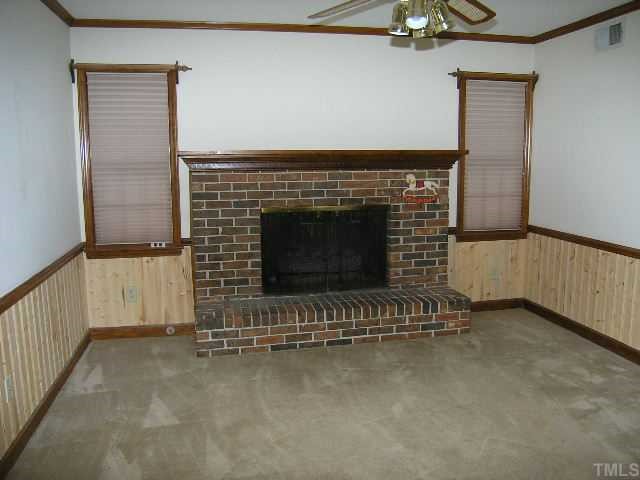1108 Imperial Road Cary, NC 27511 - Photo 4 of 5 a view of fireplace and stairs
