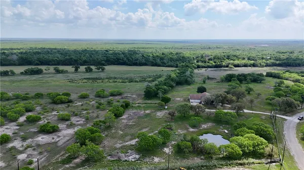 a view of a lush green field