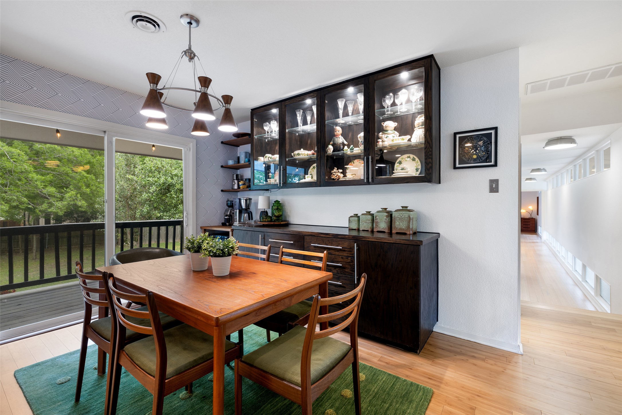 1712 McCoy Place Georgetown, TX 78626 - Photo 14 of 34 a dining room with a wooden table and chairs