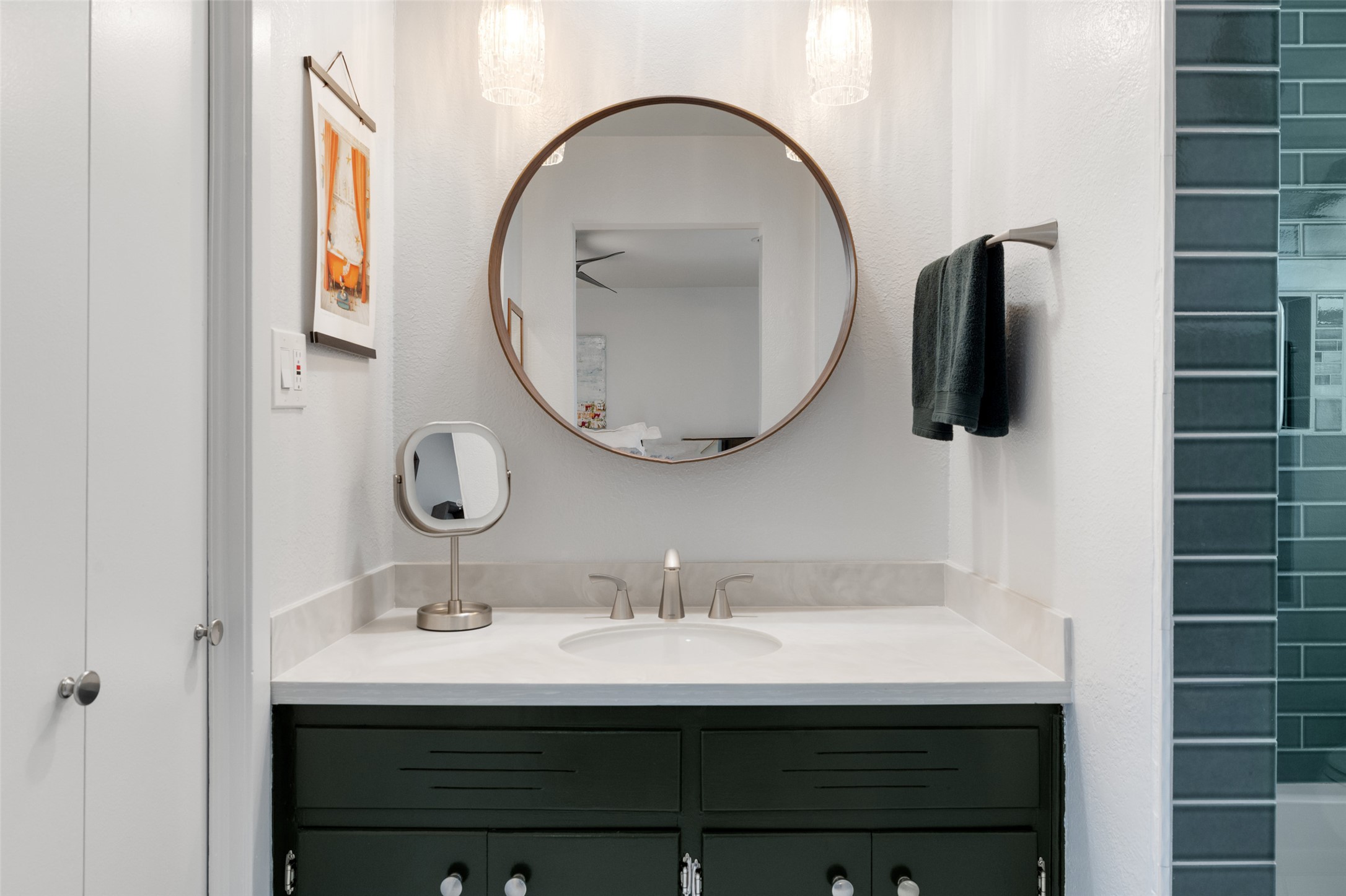 1712 McCoy Place Georgetown, TX 78626 - Photo 22 of 34 a bathroom with a sink and a mirror
