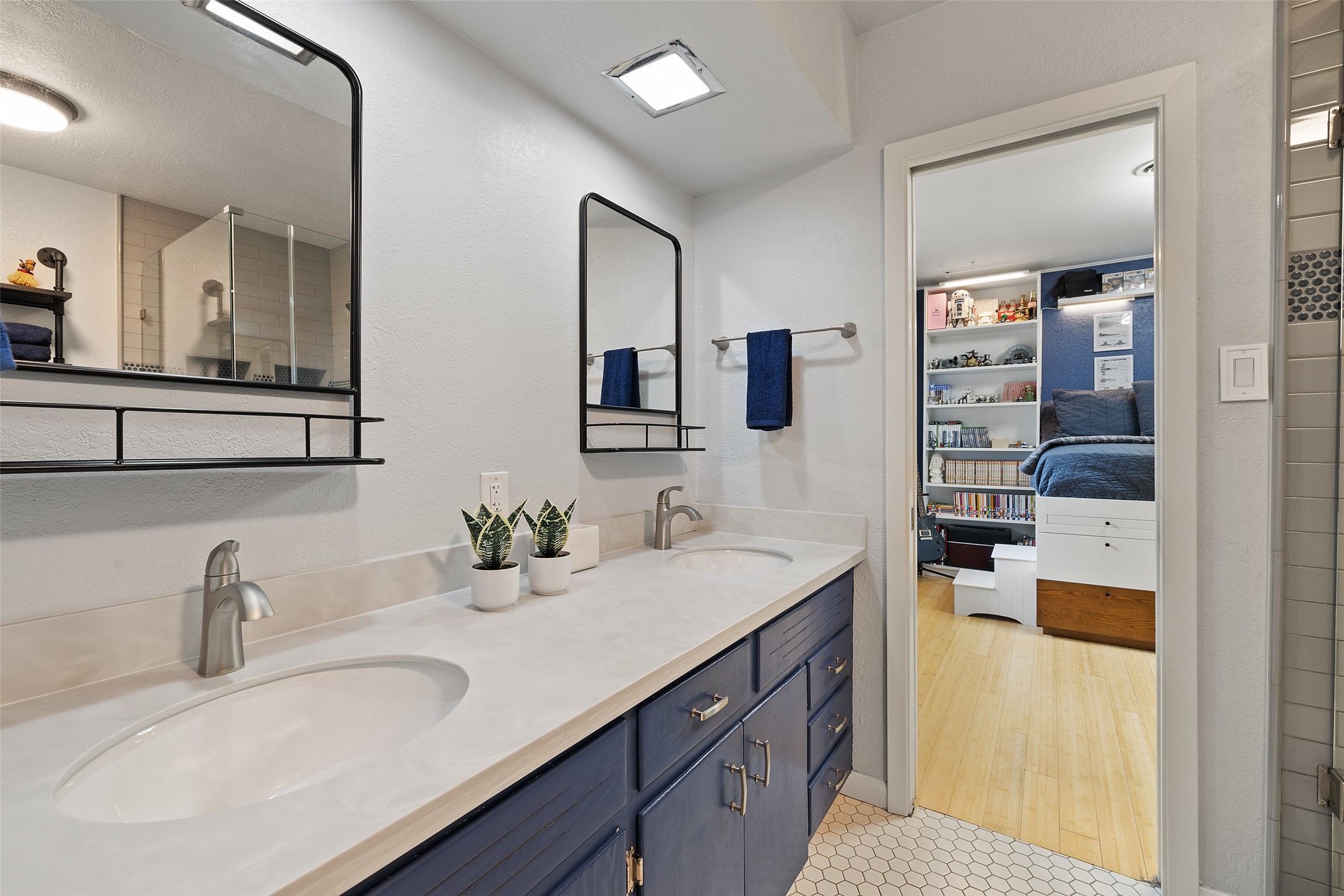 1712 McCoy Place Georgetown, TX 78626 - Photo 26 of 34 a bathroom with a sink double vanity and a mirror