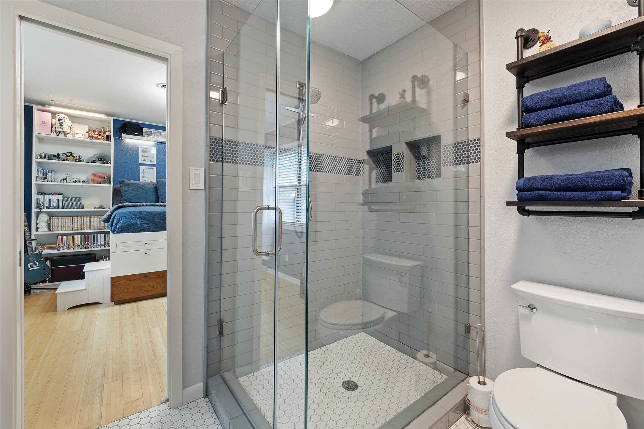 1712 McCoy Place Georgetown, TX 78626 - Photo 27 of 34 a bathroom with a shower and toilet