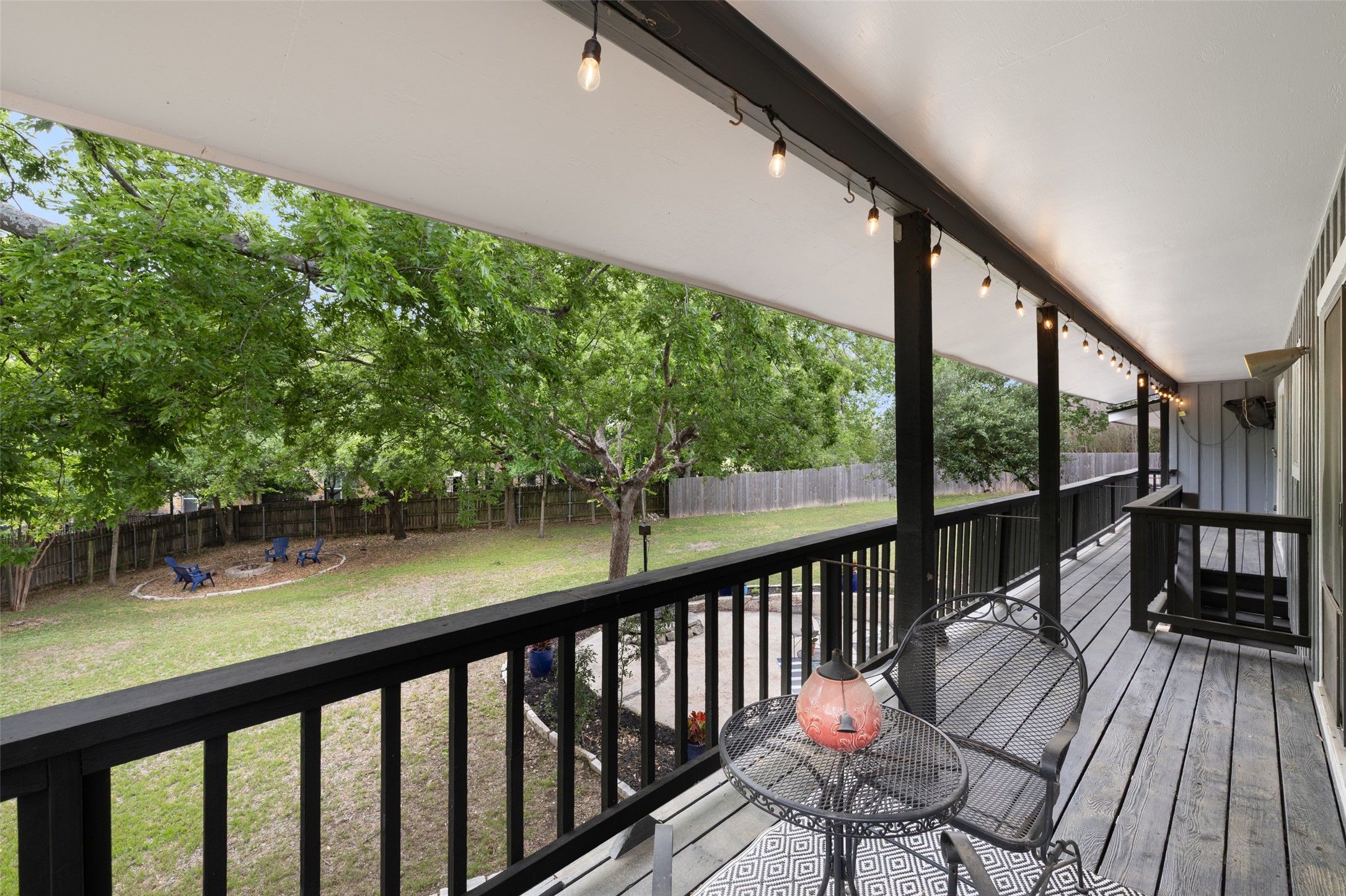 1712 McCoy Place Georgetown, TX 78626 - Photo 31 of 34 a balcony with wooden floor and outdoor space