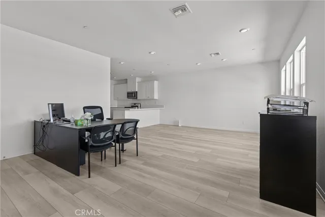 a workspace with furniture and window