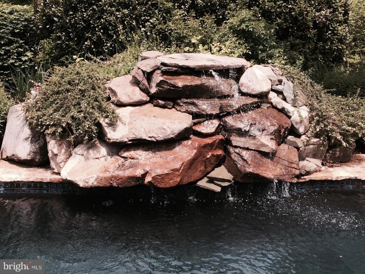 6200 Evergreen Mountain Road Broad Run, VA 20137 - Photo 22 of 29 Pool waterfall