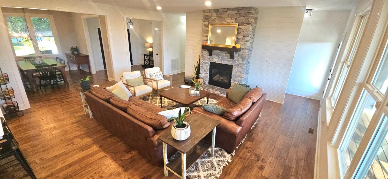 13429 Leesville Road Evington, VA 24550 - Photo 16 of 84 Great room w/ floor to ceilinf stone stacked gas log FP, DR to left