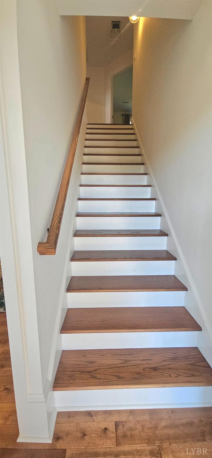 13429 Leesville Road Evington, VA 24550 - Photo 54 of 84 Hardwood stairs to 2nd floor