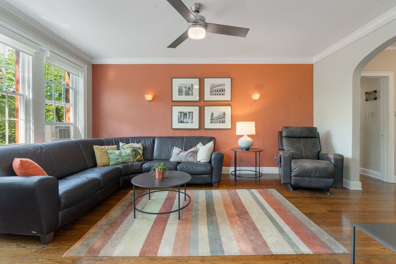 1217 Hull Terrace, Unit 3A Evanston, IL 60202 - Photo 3 of 28 a living room with furniture and a large window