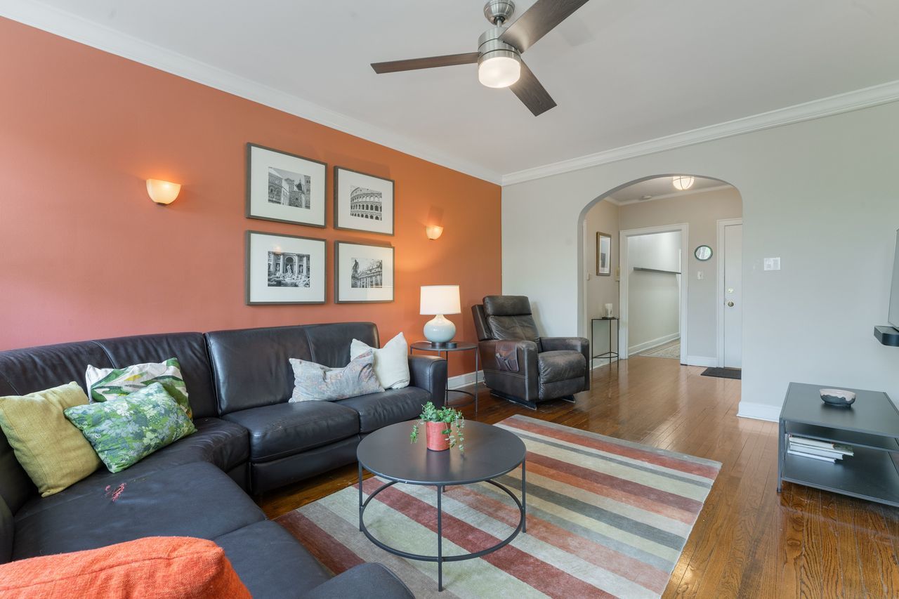 1217 Hull Terrace, Unit 3A Evanston, IL 60202 - Photo 4 of 28 a living room with furniture and a large window