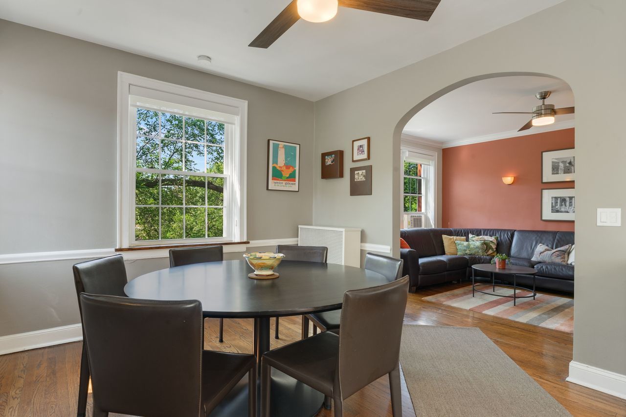 1217 Hull Terrace, Unit 3A Evanston, IL 60202 - Photo 7 of 28 a living room with furniture and a window