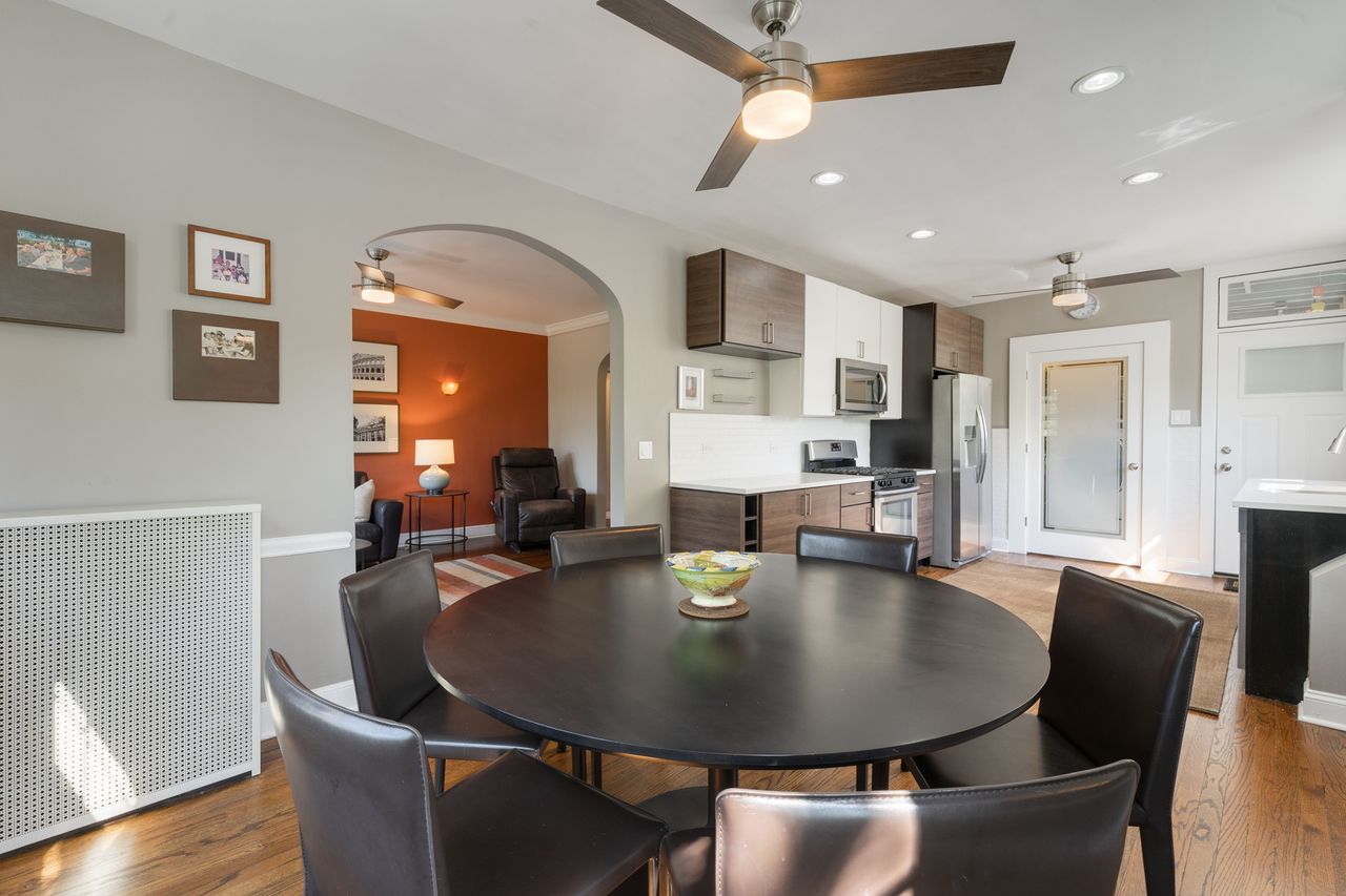1217 Hull Terrace, Unit 3A Evanston, IL 60202 - Photo 8 of 28 a view of a dining room with furniture and wooden floor