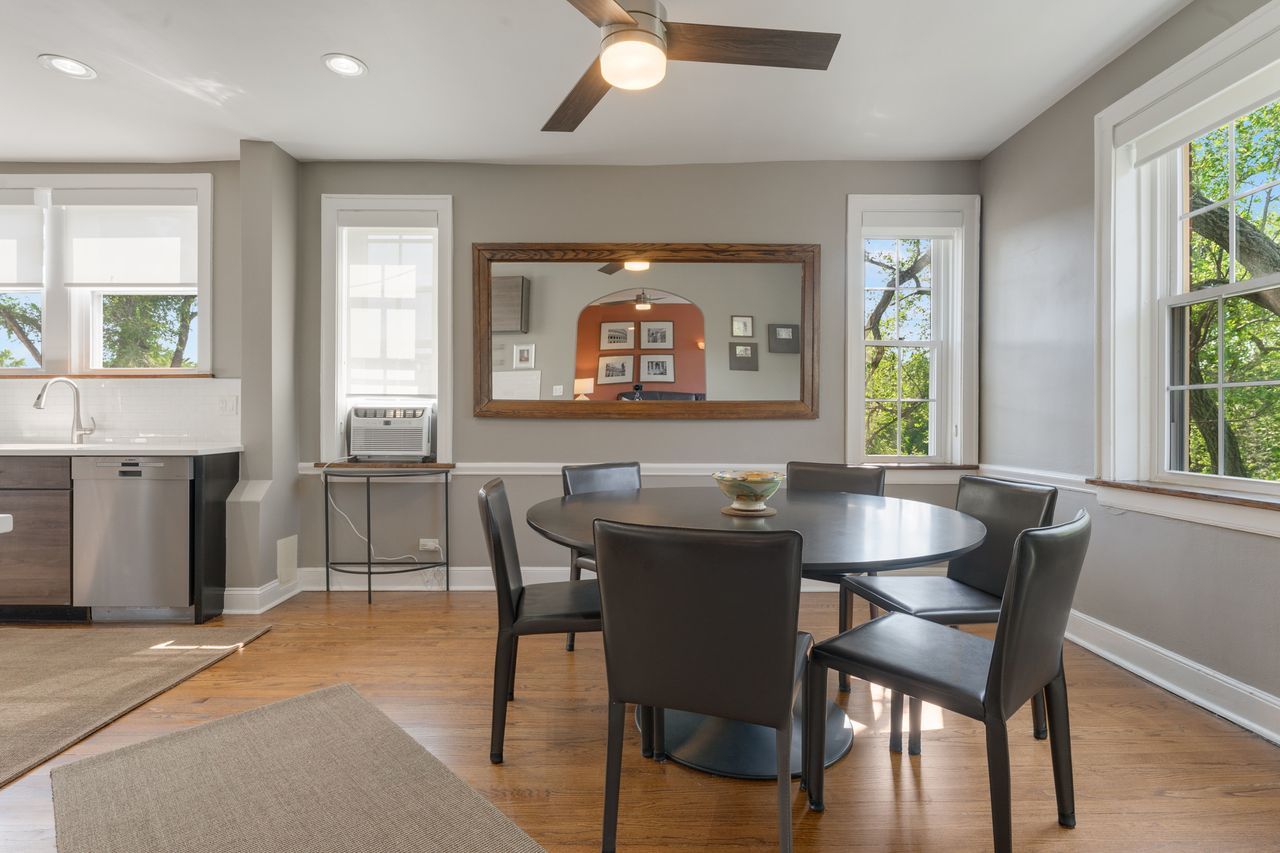 1217 Hull Terrace, Unit 3A Evanston, IL 60202 - Photo 9 of 28 a view of a a dining room with furniture window and outside view