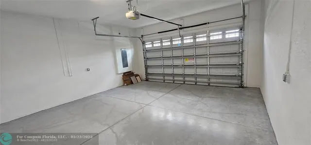 a view of a park with swings and slides