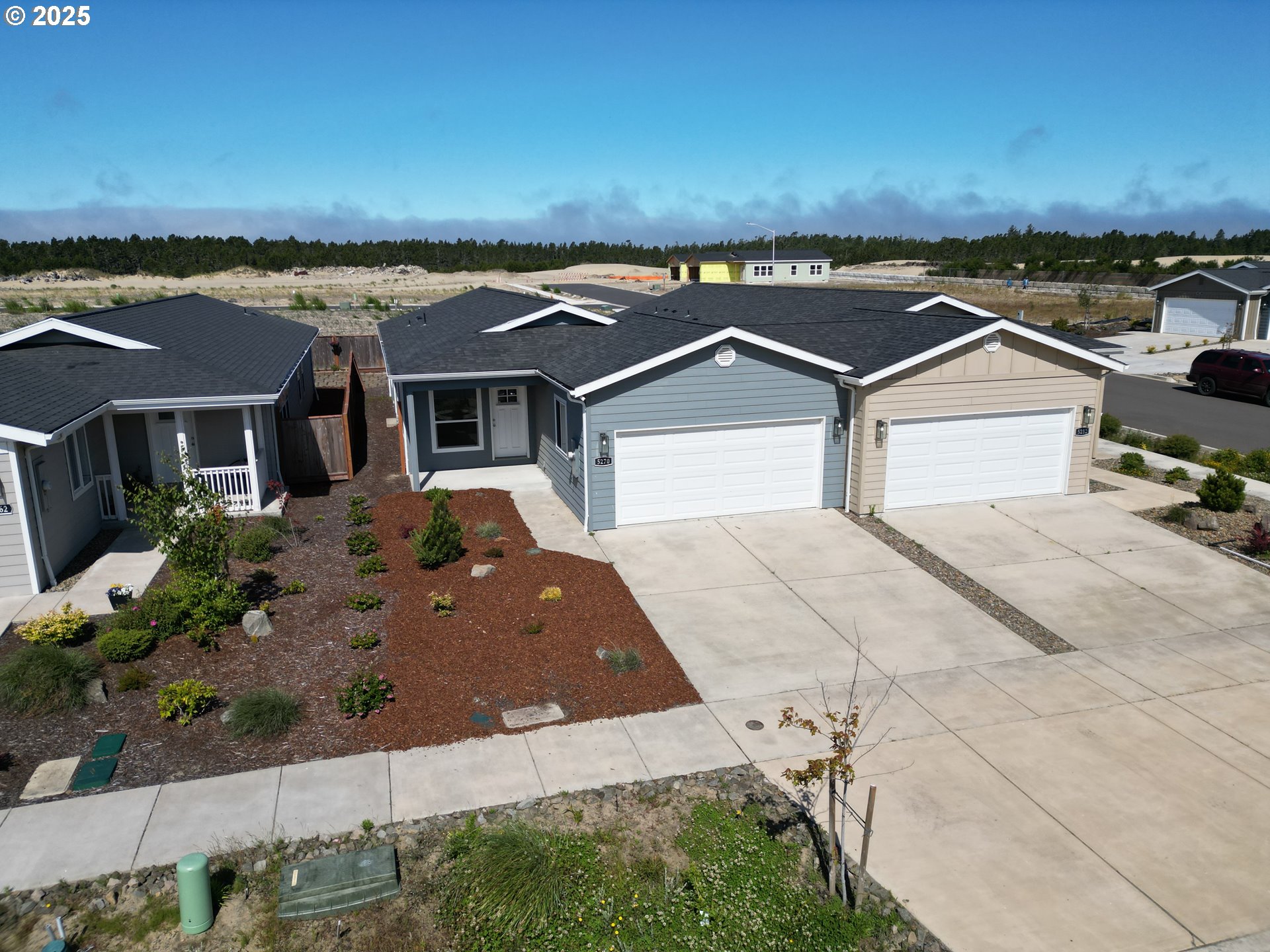 5270 Nopal Street Florence, OR 97439 - Photo 3 of 27 an aerial view of a house with a yard
