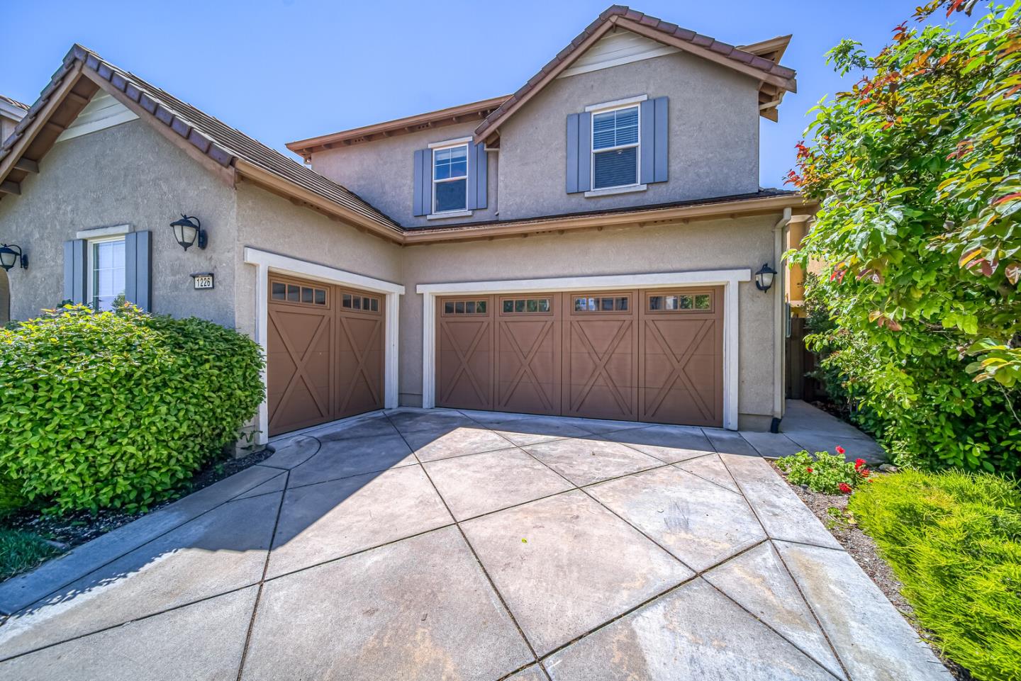 1226 Halifax Way San Ramon, CA 94582 - Photo 13 of 13 a front view of a house with a garden and garage