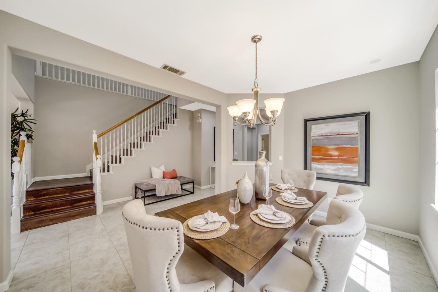 1226 Halifax Way San Ramon, CA 94582 - Photo 4 of 13 a view of a dining room with furniture wooden floor and chandelier