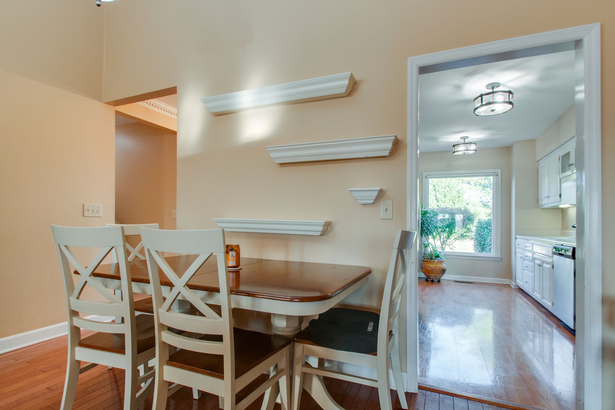 149 Morton Mill Circle Nashville, TN 37221 - Photo 13 of 27 a view of a dining room with furniture and wooden floor