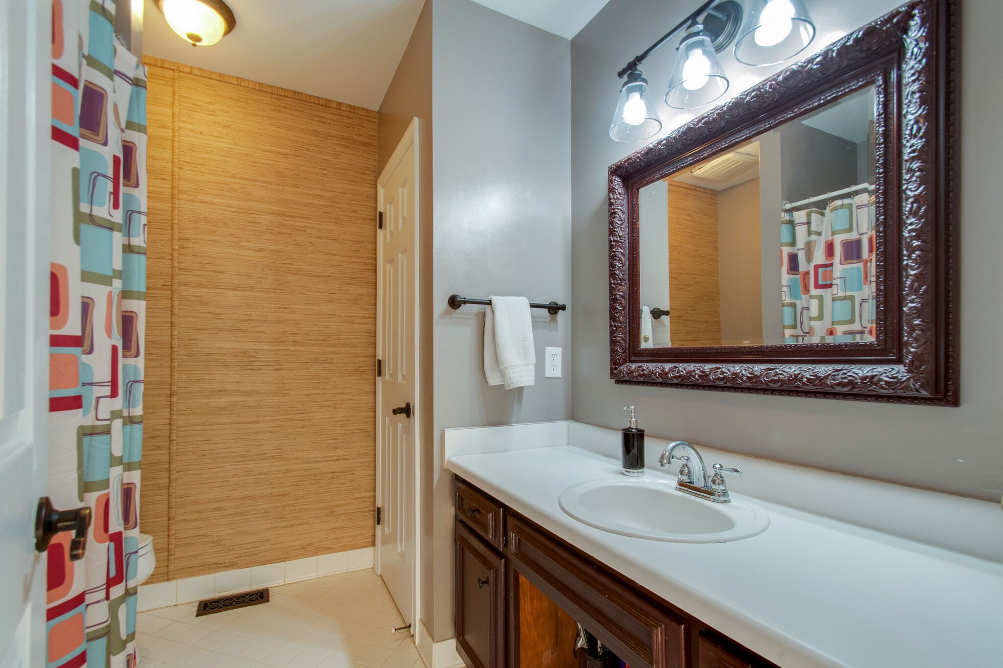 149 Morton Mill Circle Nashville, TN 37221 - Photo 23 of 27 a bathroom with a sink vanity and a mirror