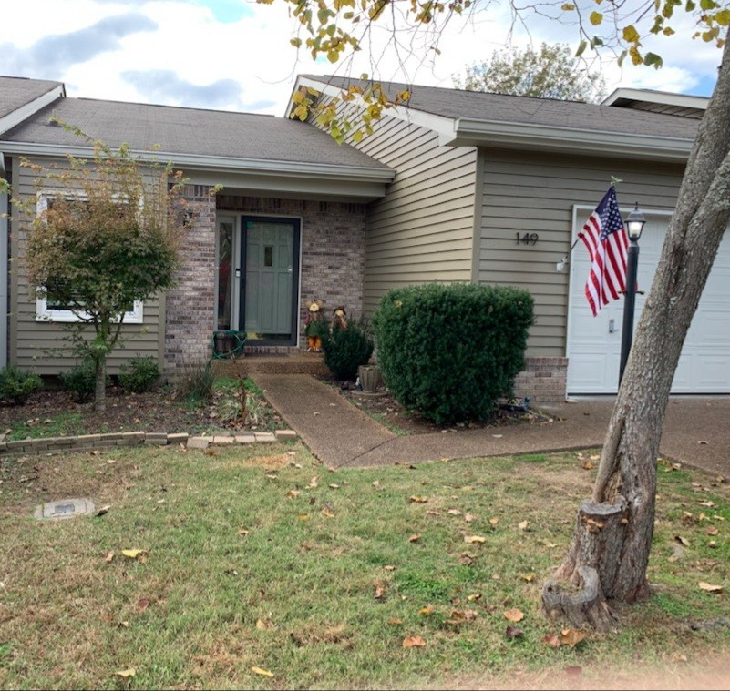 149 Morton Mill Circle Nashville, TN 37221 - Photo 27 of 27 a front view of a house with garden