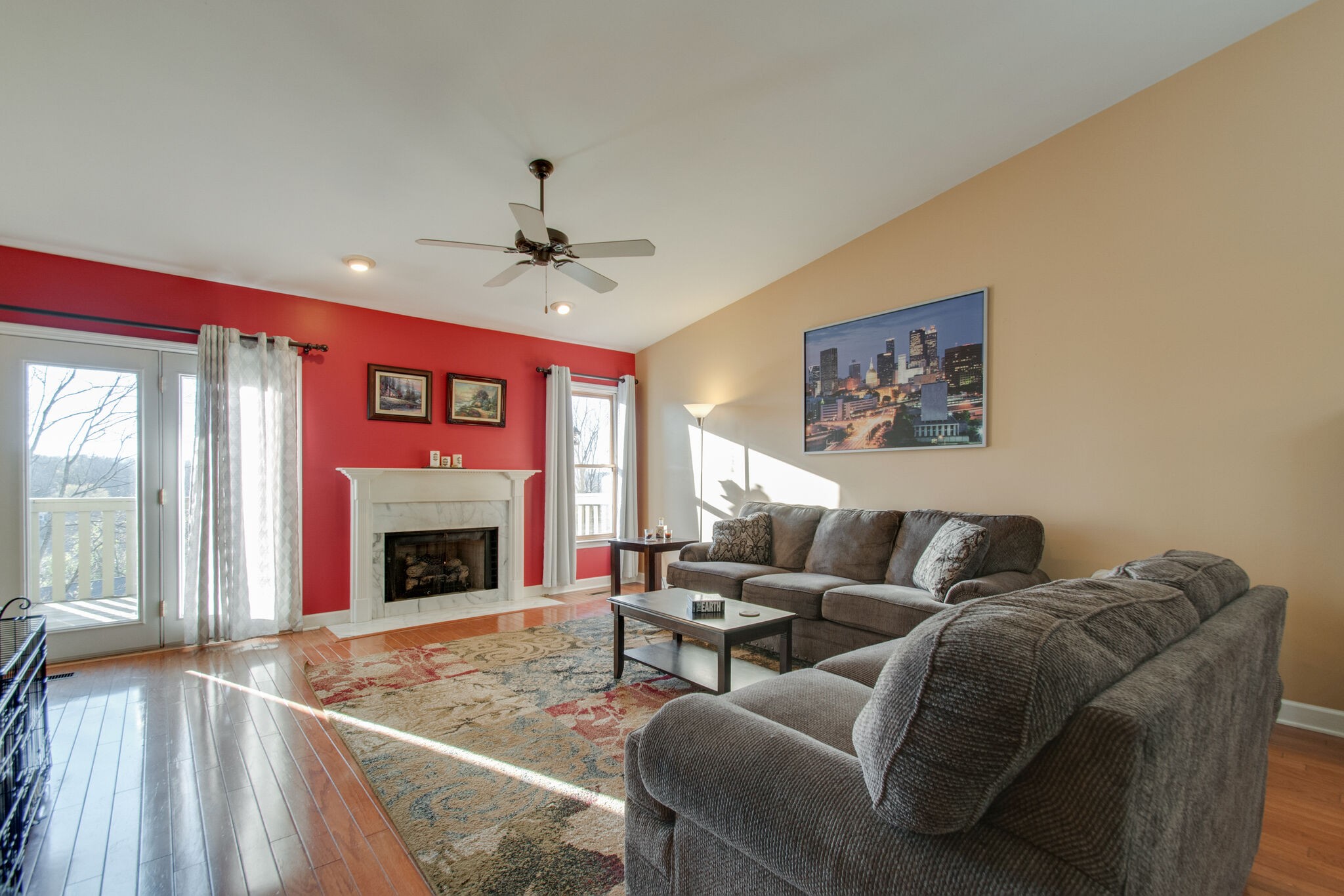 149 Morton Mill Circle Nashville, TN 37221 - Photo 8 of 27 a living room with furniture a flat screen tv and a fireplace