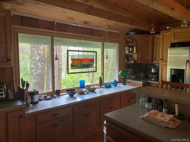 a kitchen with a sink and a stove