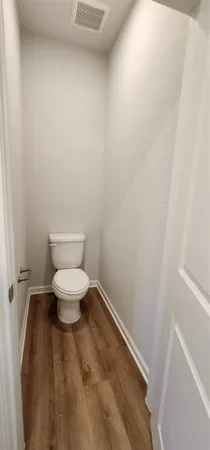 a bathroom with a double vanity sink mirror and shower