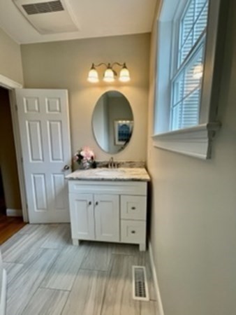 21 Gibbs Road Berlin, MA 01503 - Photo 11 of 29 a bathroom with a sink and a mirror